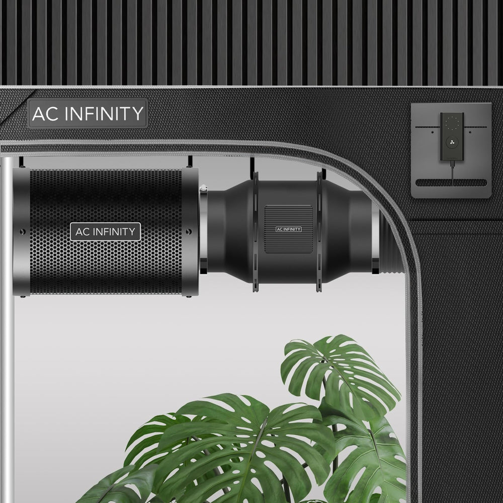 AC Infinity kit next to a hand for scale showing compact space-saving benefit