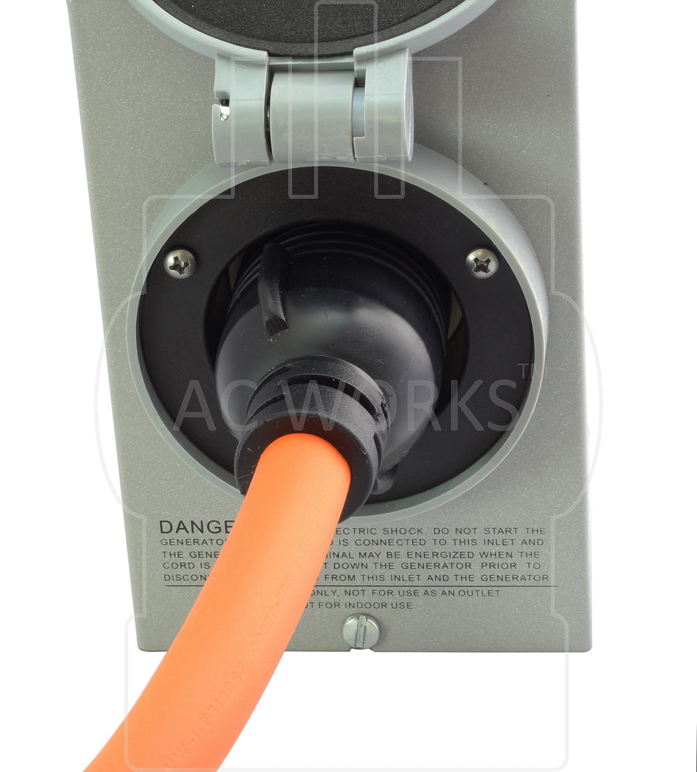 AC WORKS adapter held in hand to show scale and heavy-duty 30A construction