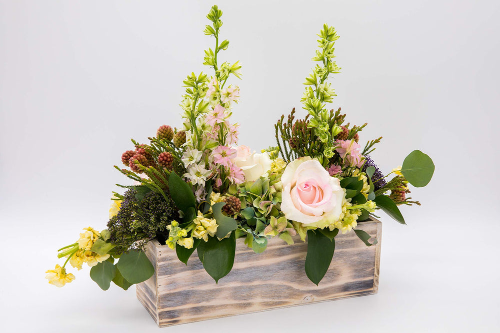 Accent Decor used as a table centerpiece at a wedding providing coordinated rustic styling
