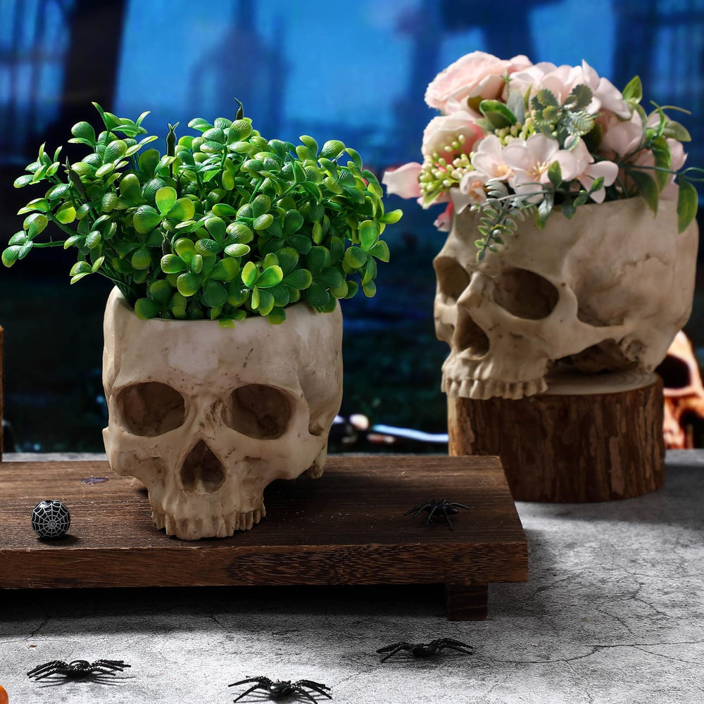 Acellegic skull planters styled on a mantel with candles for seasonal gothic styling