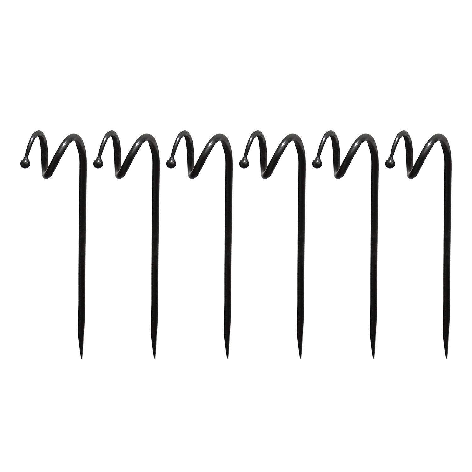 Achla Designs hose guide in garden directing hose along bed edge, protects plants