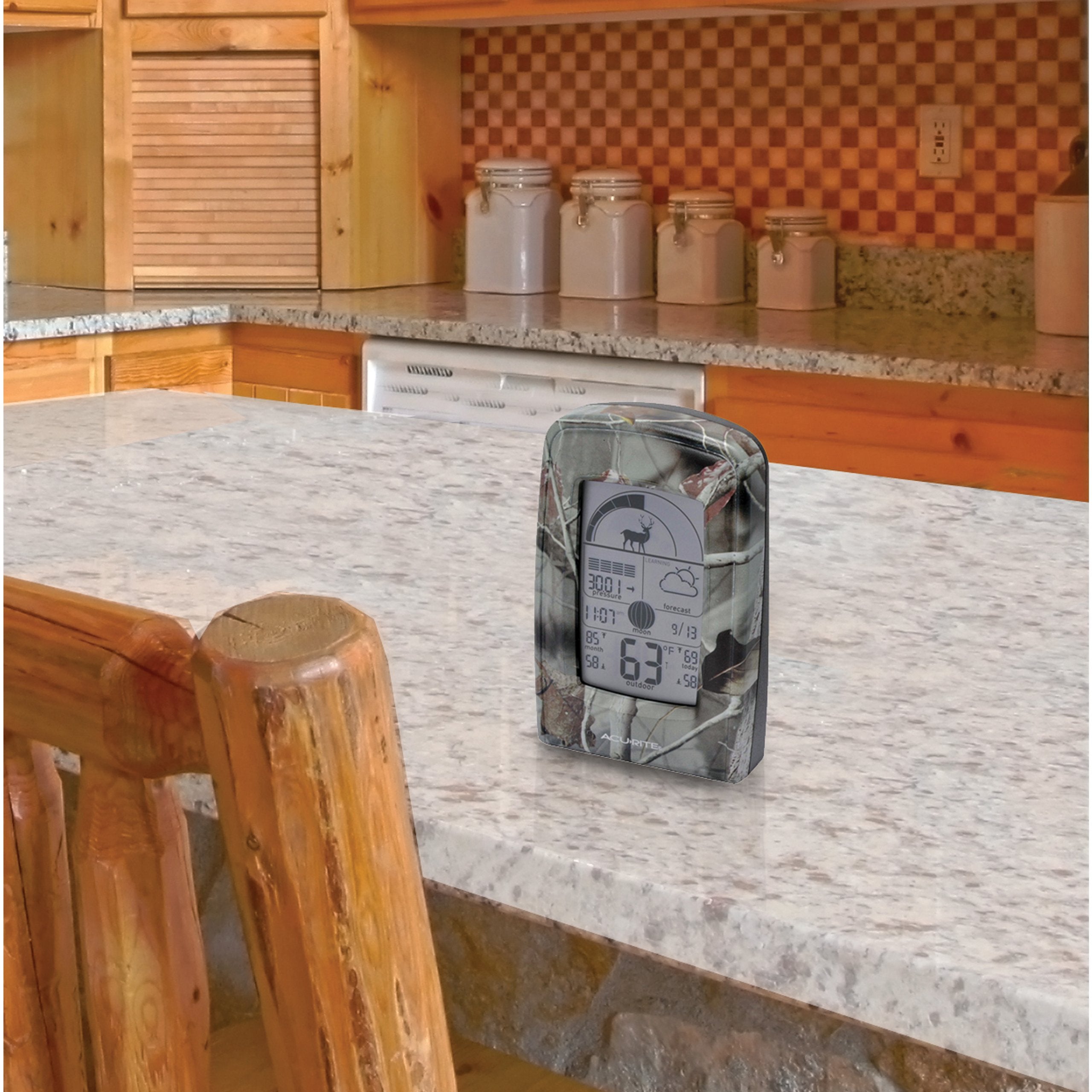 AcuRite outdoor sensor close-up mounted under eave showing durable weatherproof design