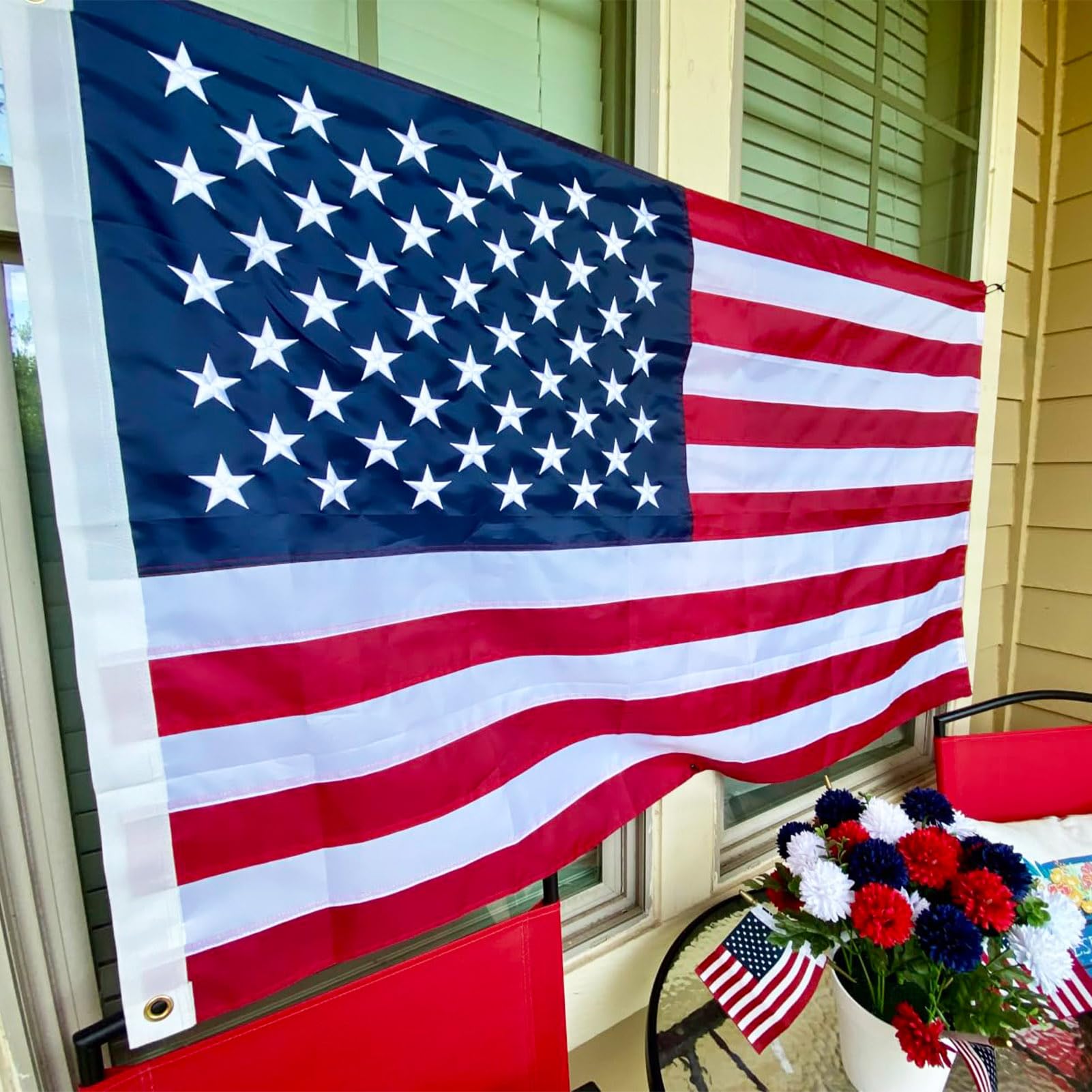 ADVELILD flag displayed in front yard lifestyle shot enhancing curb appeal