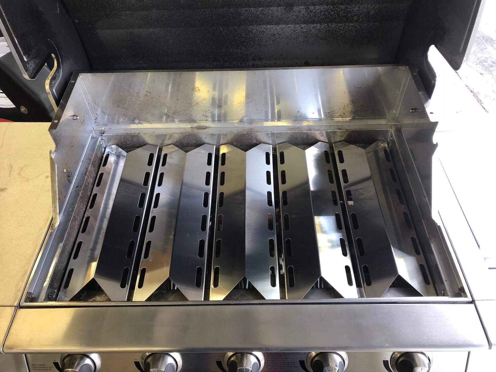 Adviace grill in backyard after rebuild, improved cooking performance benefit