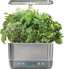 AeroGarden Harvest Elite front view showing stainless steel finish and six-plant layout for modern kitchens