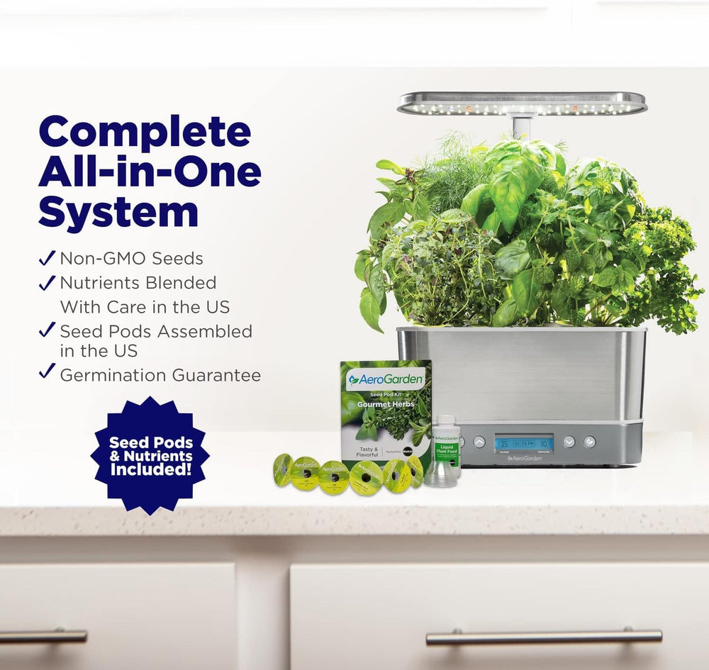 AeroGarden on kitchen counter with fresh herbs, illustrating convenient culinary access