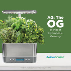 AeroGarden Seed pods with herbs growing, demonstrating organized six-plant hydroponic setup