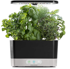 AeroGarden Harvest front view showing compact hydroponic garden and six plant pods for fresh herbs