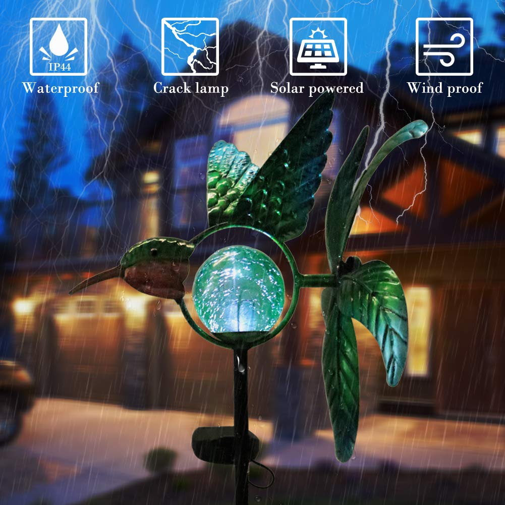 Afirst crackle-glass globe detail, provides soft white ambient lighting