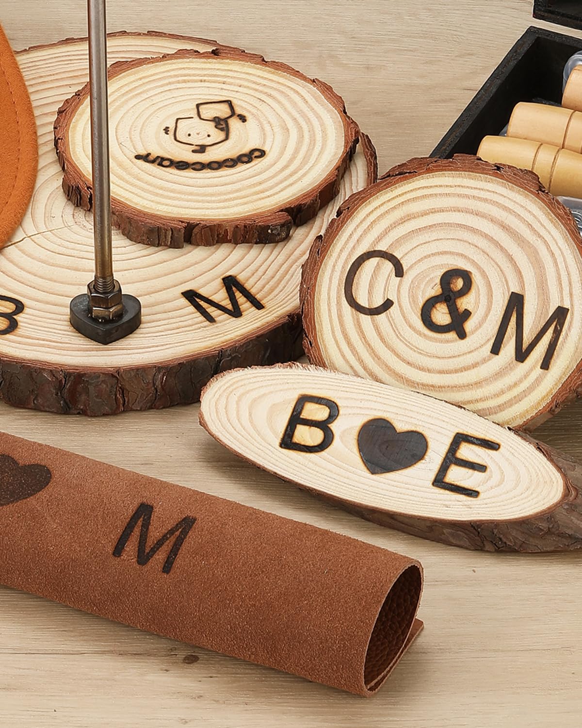 AIMOADO array of 1-inch iron letter stamps laid out for selection benefit clarity