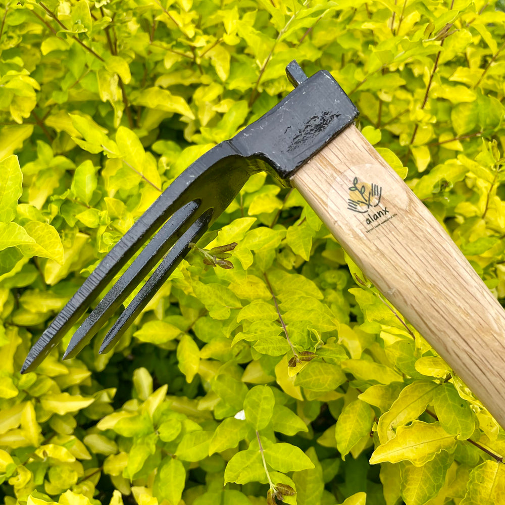 alanx action shot chopping through roots illustrating heavy-duty performance