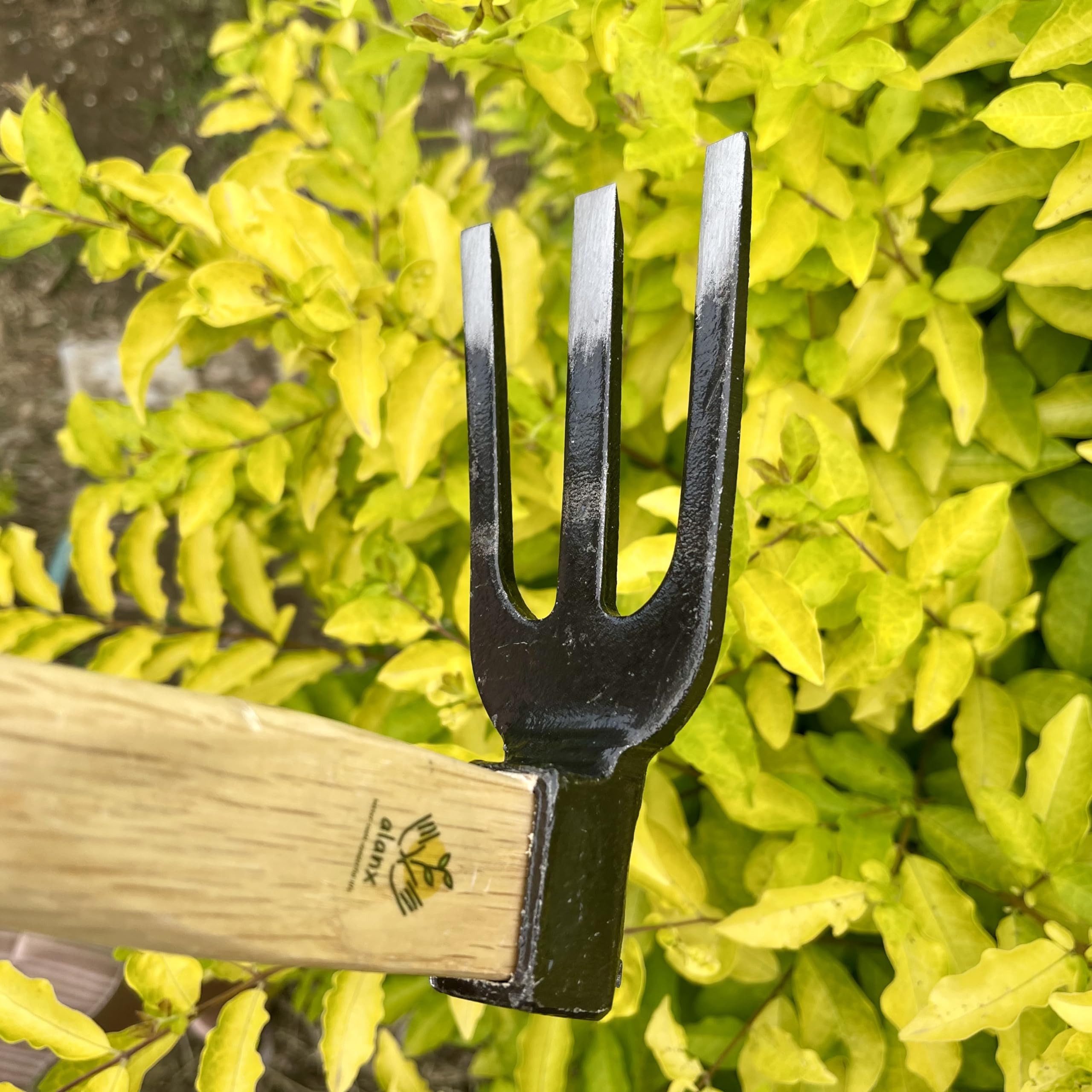 alanx tiller next to ruler showing 14-inch head for quick size reference