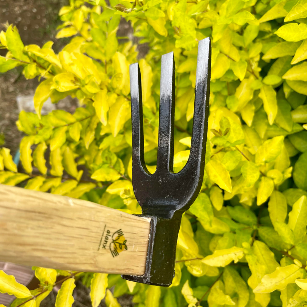 alanx tiller next to ruler showing 14-inch head for quick size reference