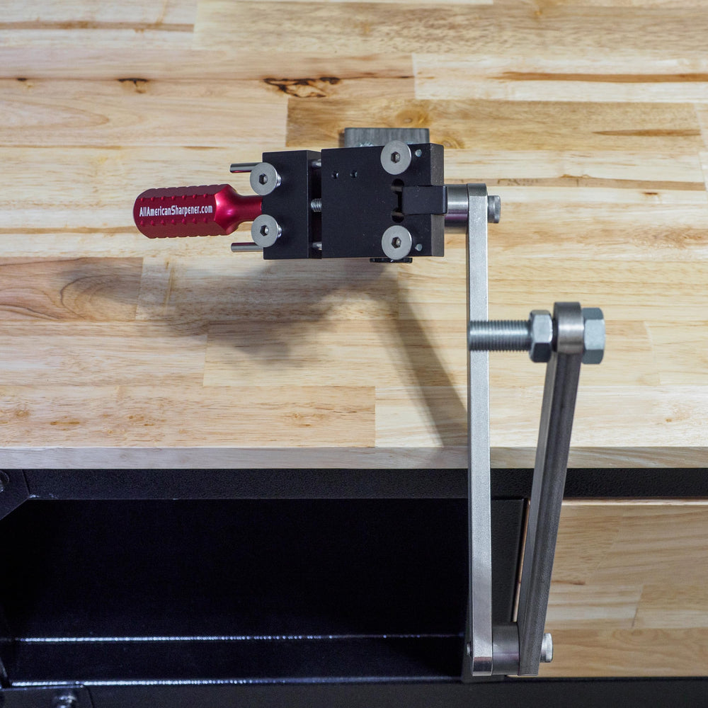 All American Sharpener blade clamp detail showing secure hold for safe, repeatable sharpening