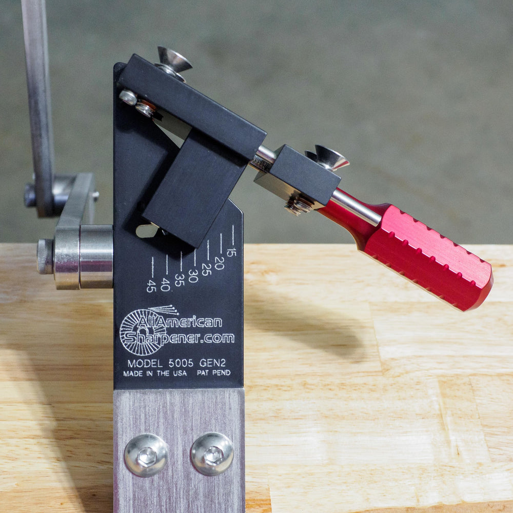 All American Sharpener being used with a cordless grinder for portable on-site blade resharpening