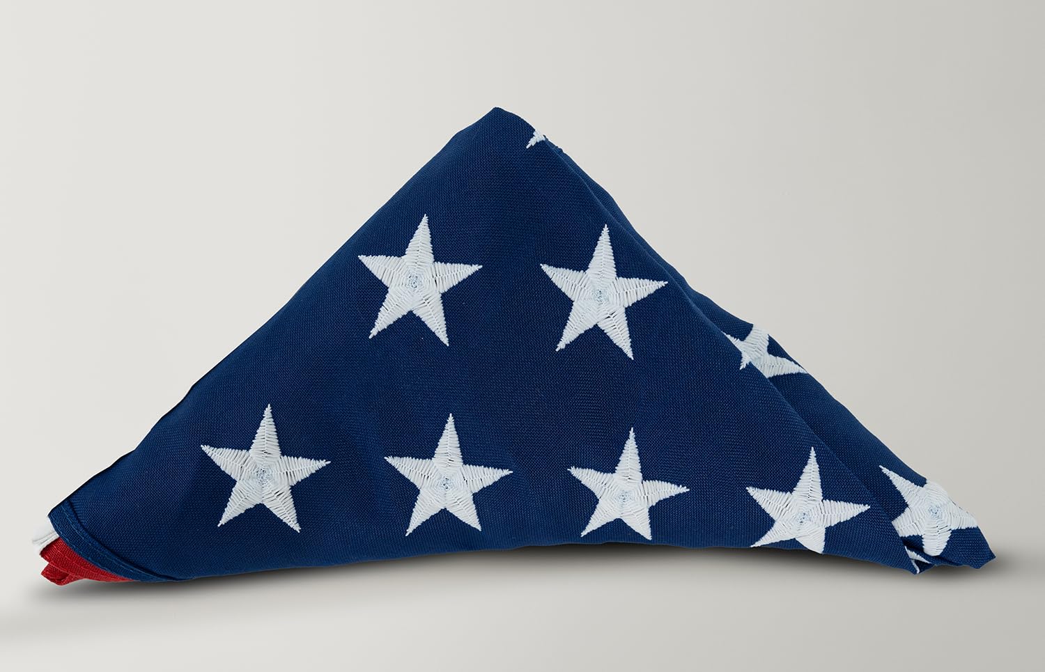 Allied Flag next to ruler showing size scale for easy installation planning