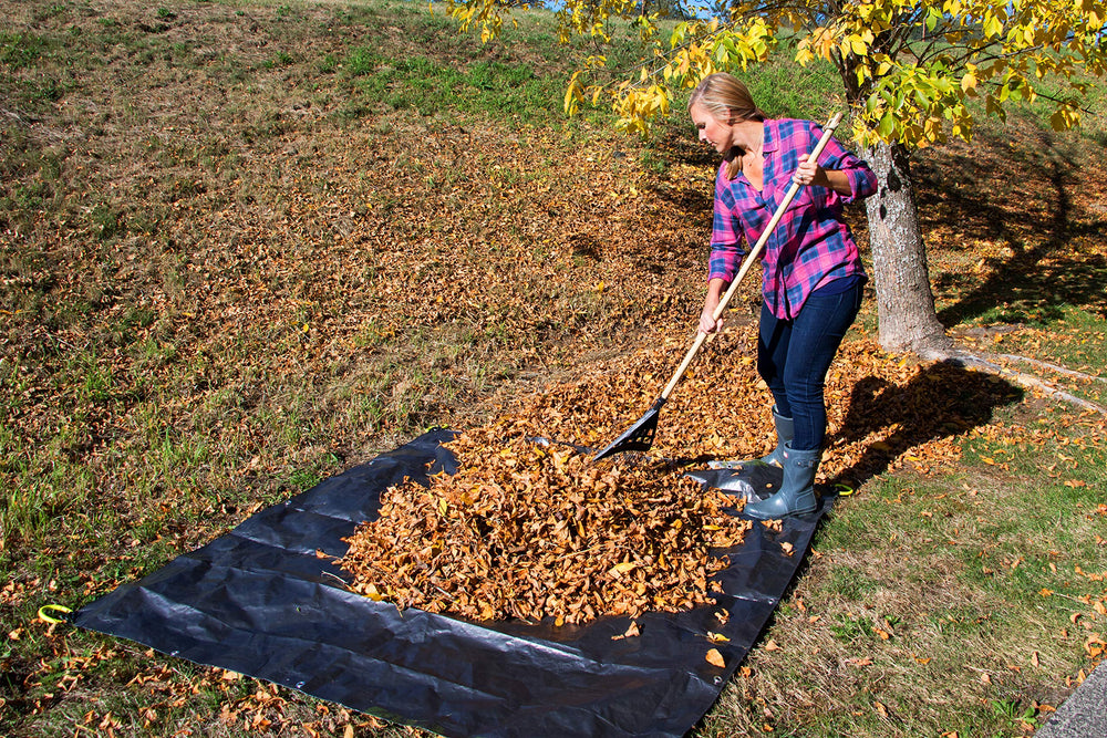 Allsop tarp loaded with yard waste demonstrating 300 lb capacity