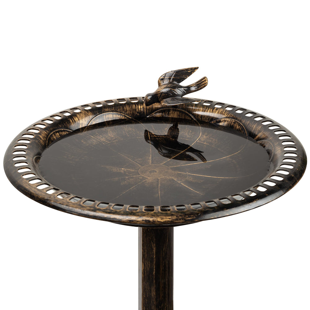 Alpine Corporation birdbath placed in garden enhancing outdoor décor