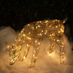 Alpine Corporation front view of rattan reindeer glowing, adds festive curb appeal