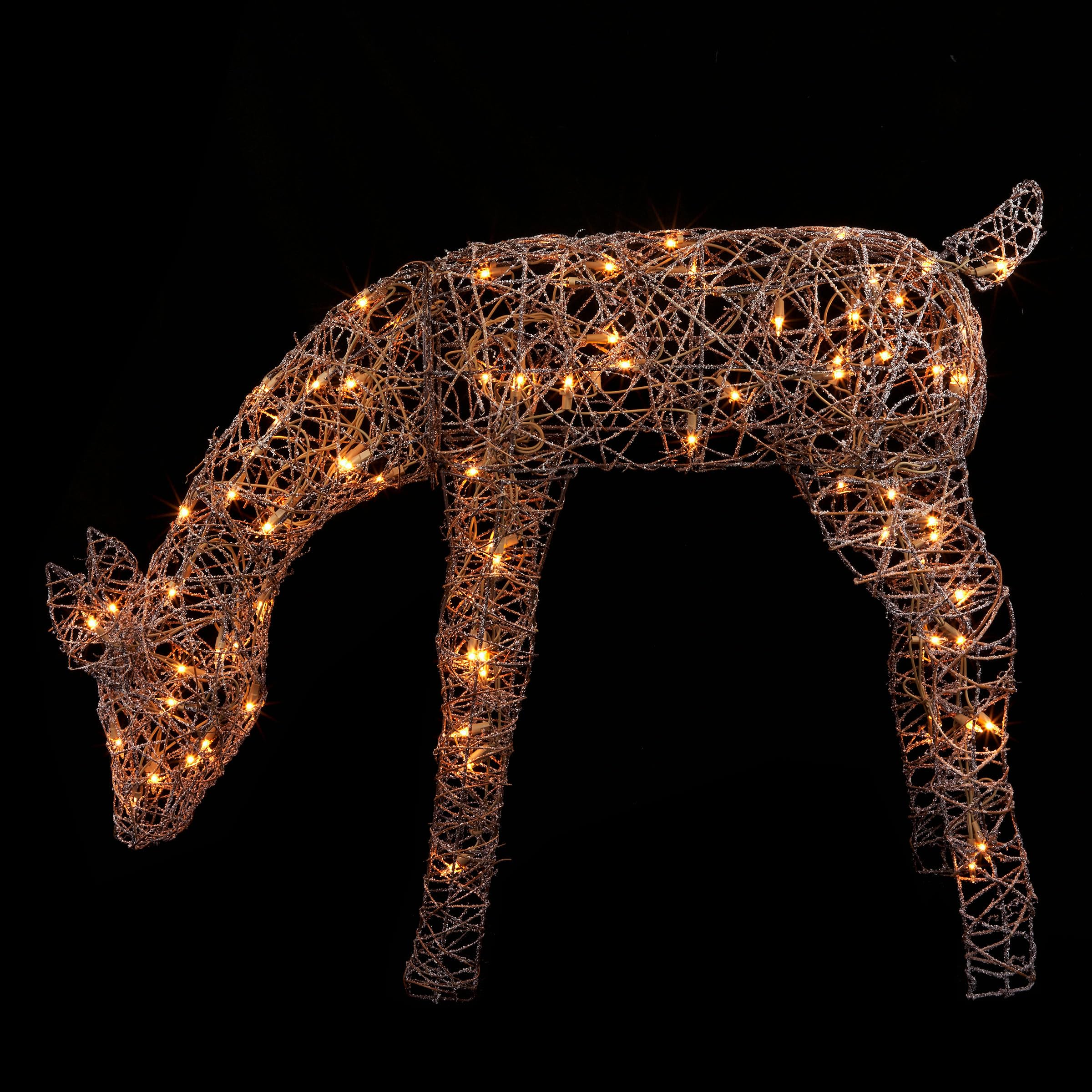 Alpine Corporation grazing reindeer in holiday scene creating cohesive yard display