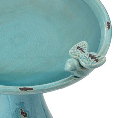 Alpine Corporation bird figurines perched on rim adding decorative charm