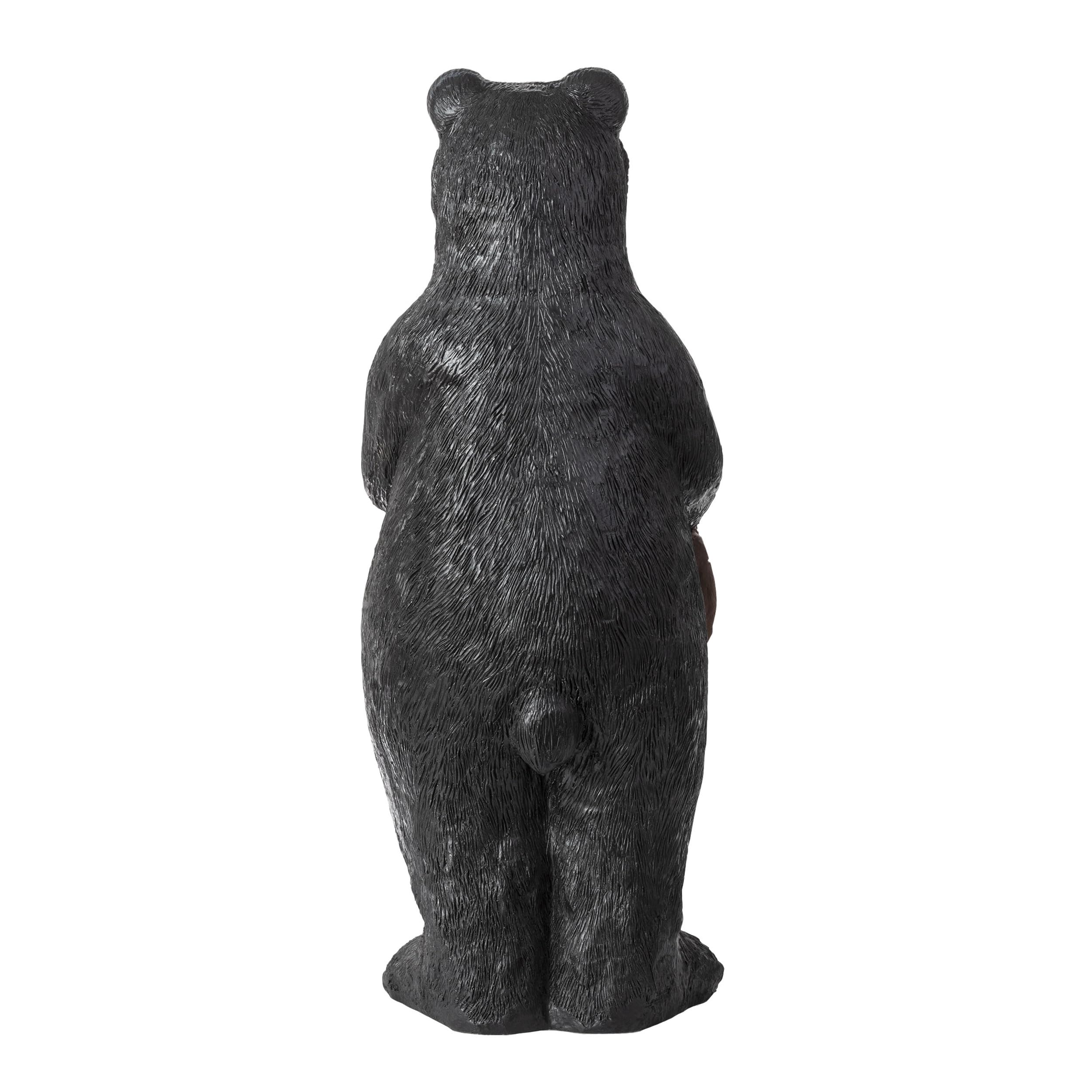 Alpine Corporation black bear placed in garden offering whimsical curb appeal
