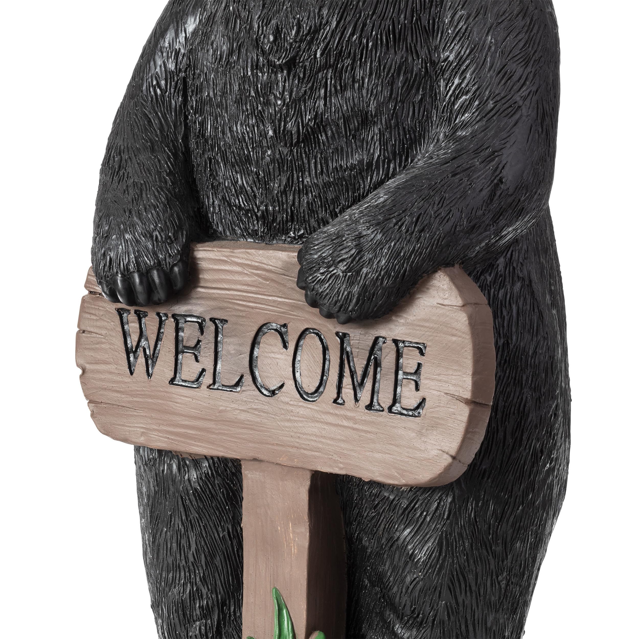 Alpine Corporation black bear near pond showing reflective decorative effect