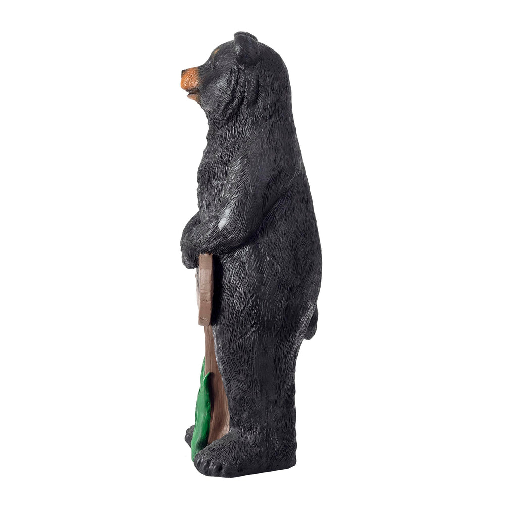 Alpine Corporation black bear next to front door demonstrating size and scale