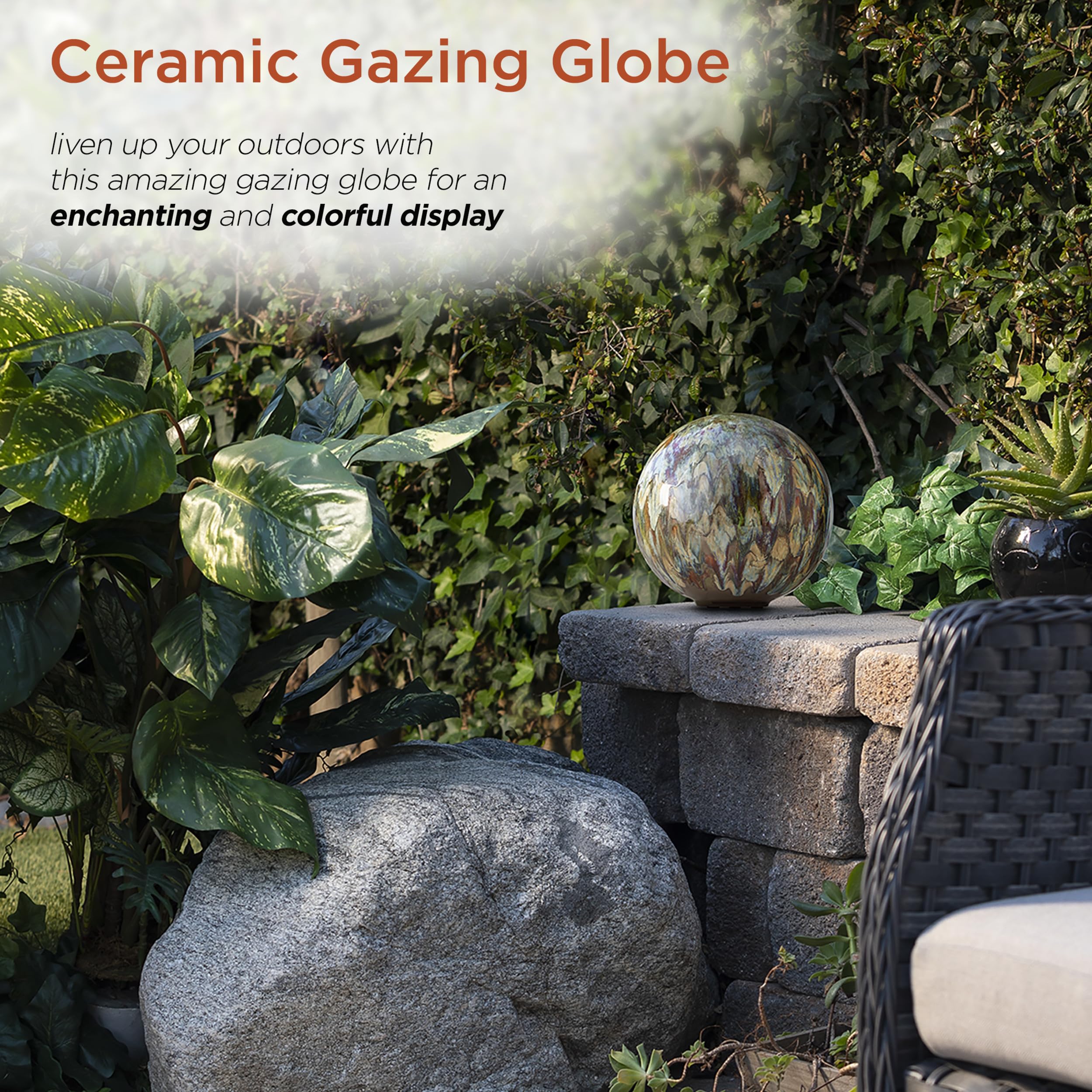 Alpine Corporation globe displayed on metal stand adding vertical garden interest