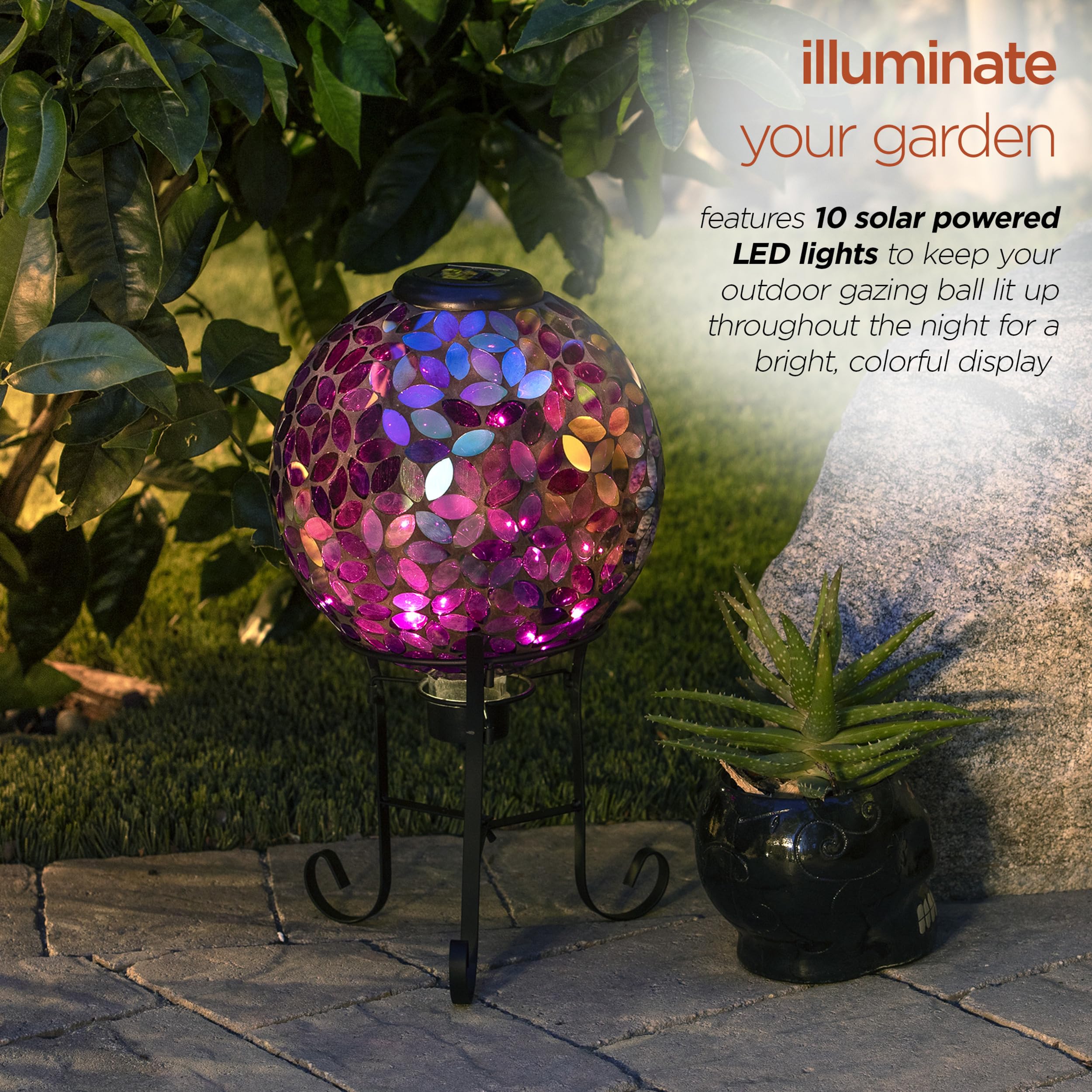 Alpine Corporation globe lit at night creating warm ambient garden lighting