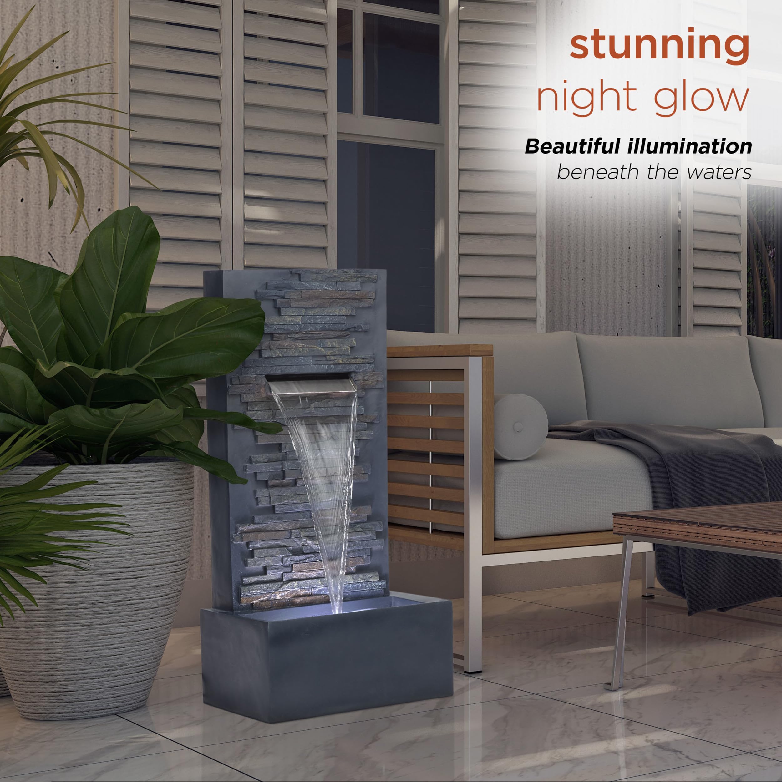 Alpine Corporation fountain illuminated by LED lights creating ambient evening atmosphere