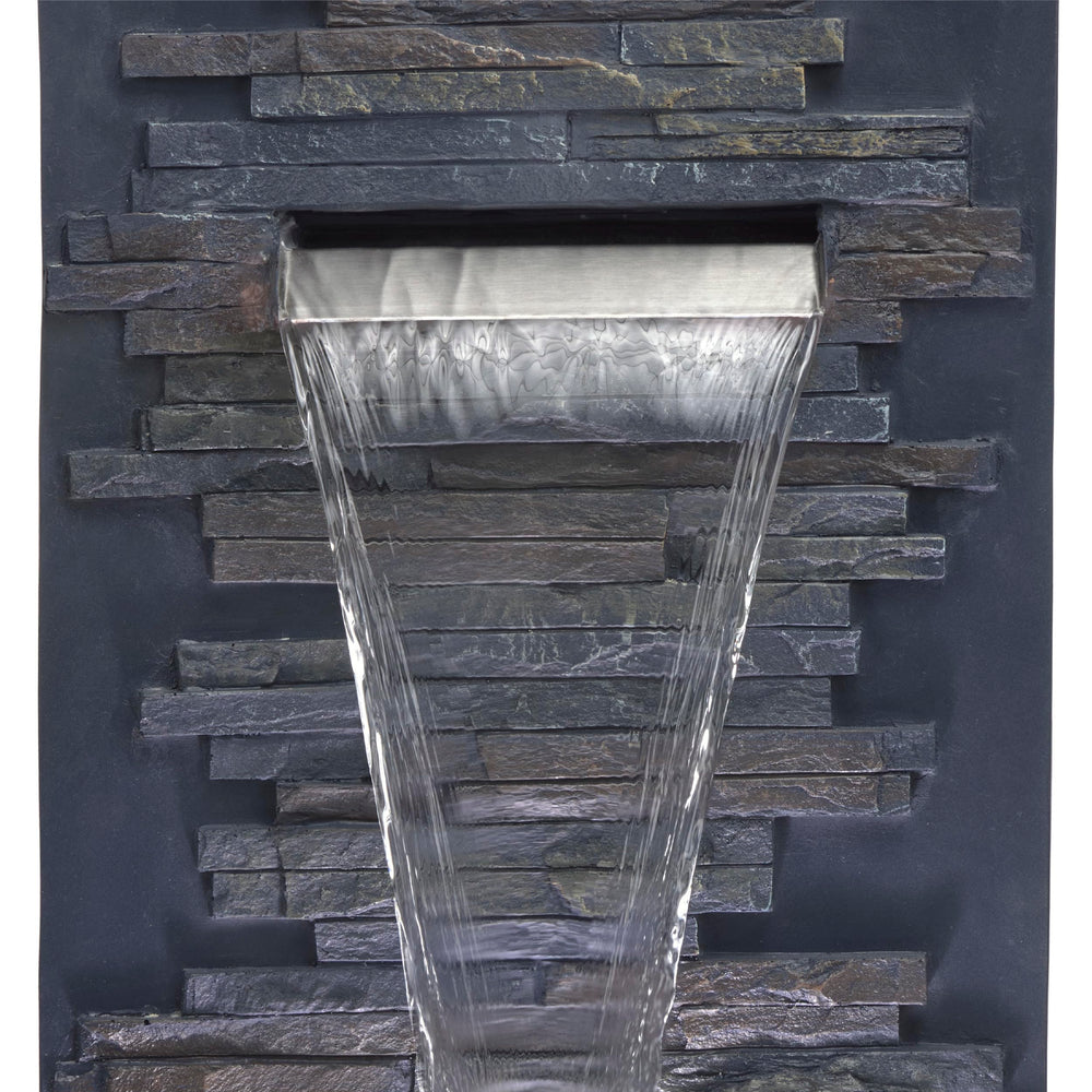 Alpine Corporation fountain in garden setting adding ambience and soft water sounds