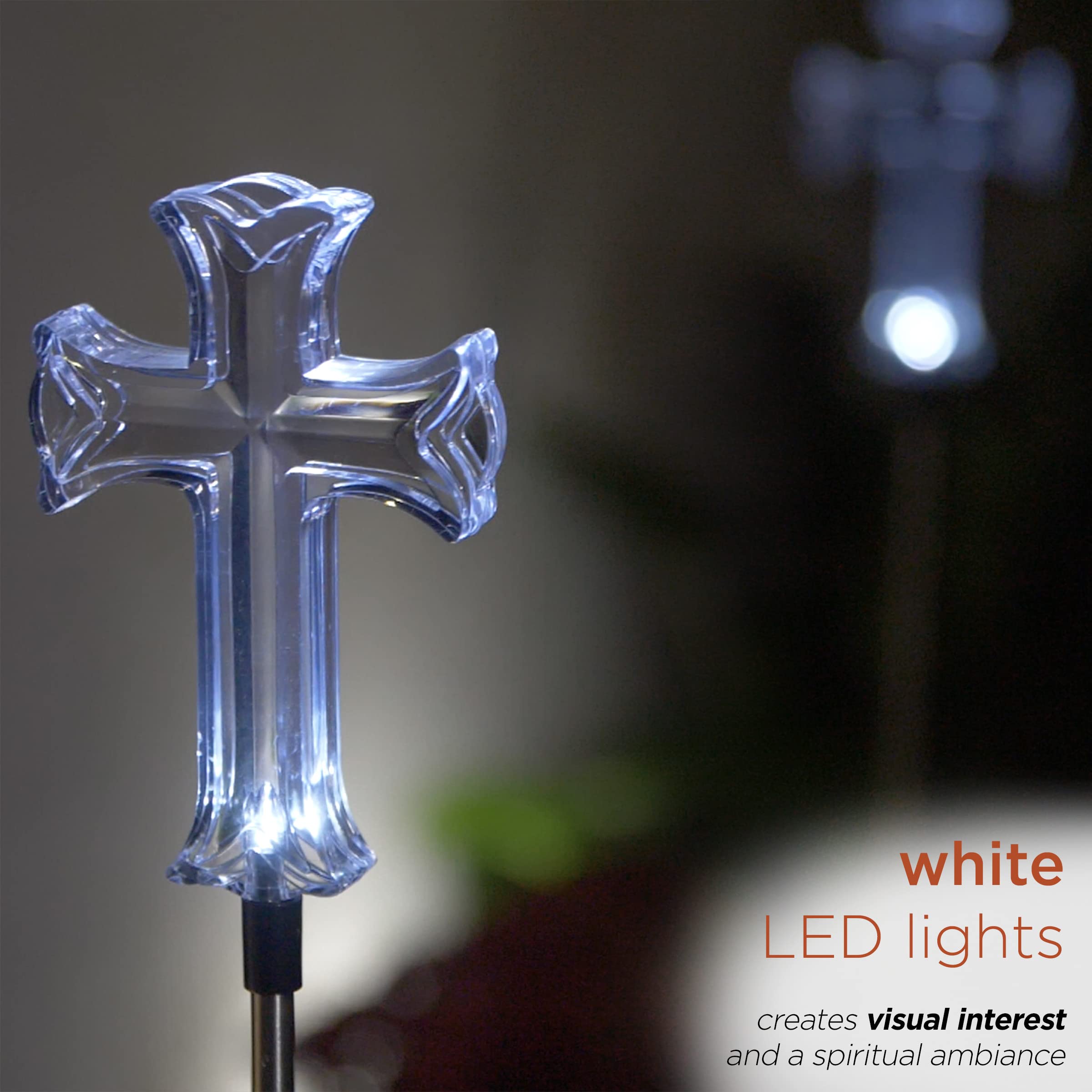 Alpine Corporation pair of cross stakes in garden creating illuminated focal points