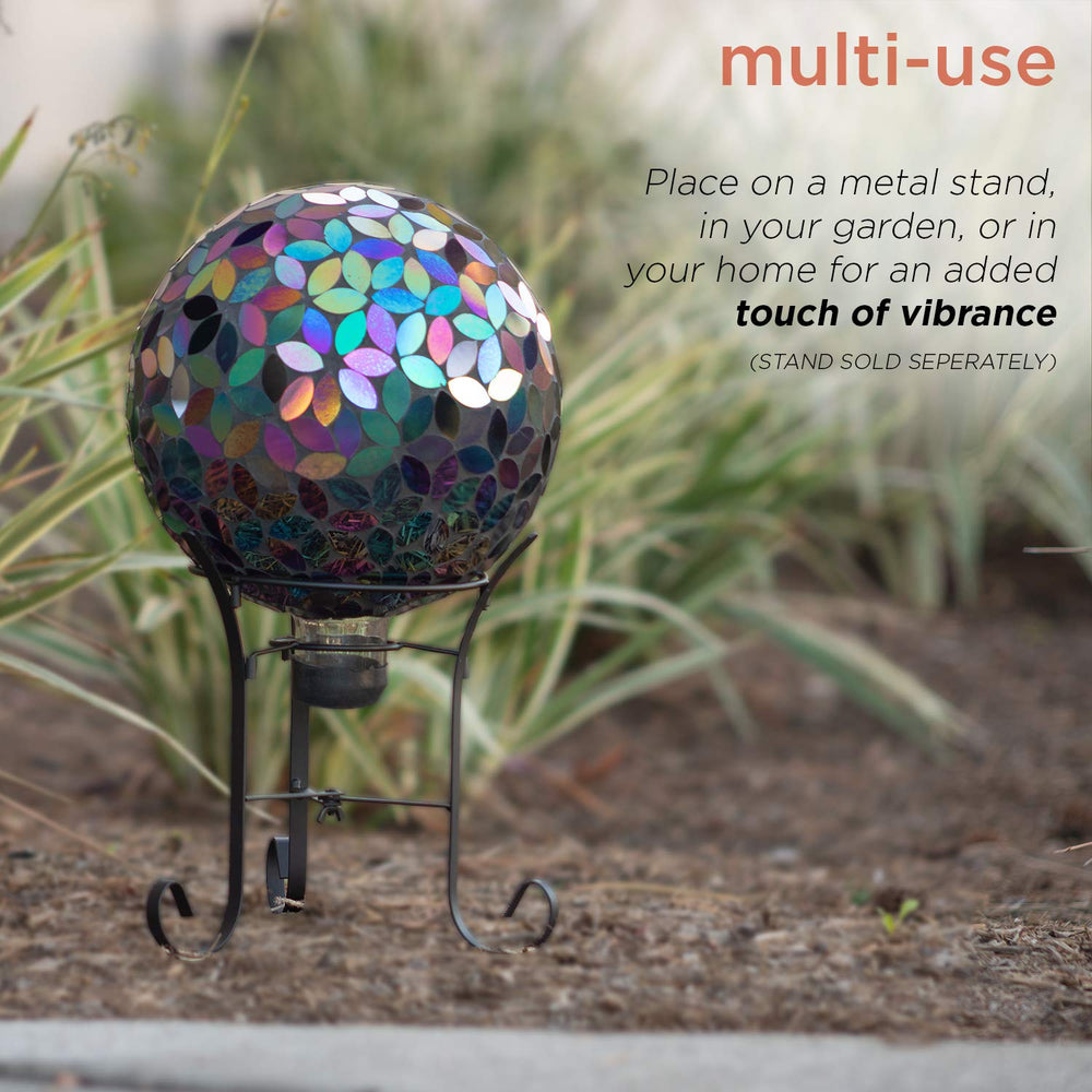 Alpine Corporation globe casting reflected light patterns on stone for decorative interest