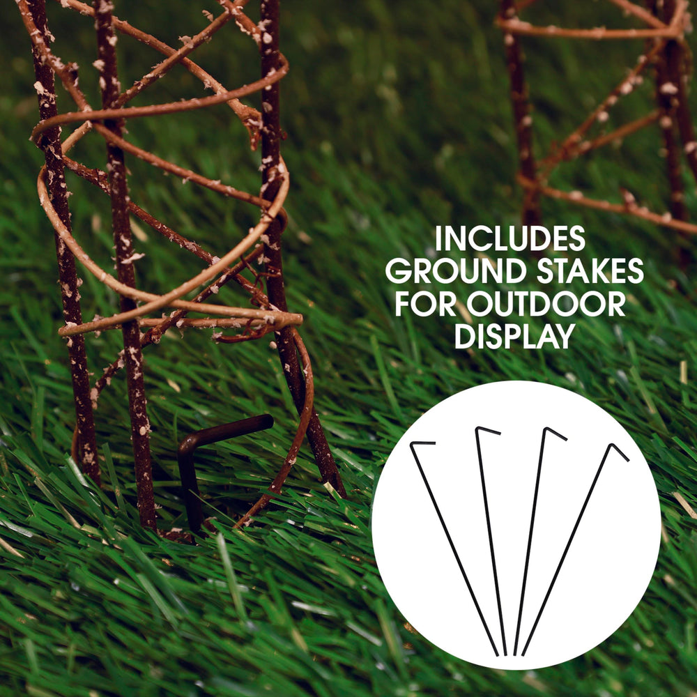 Alpine Corporation side profile of grazing reindeer showing compact shape and silhouette