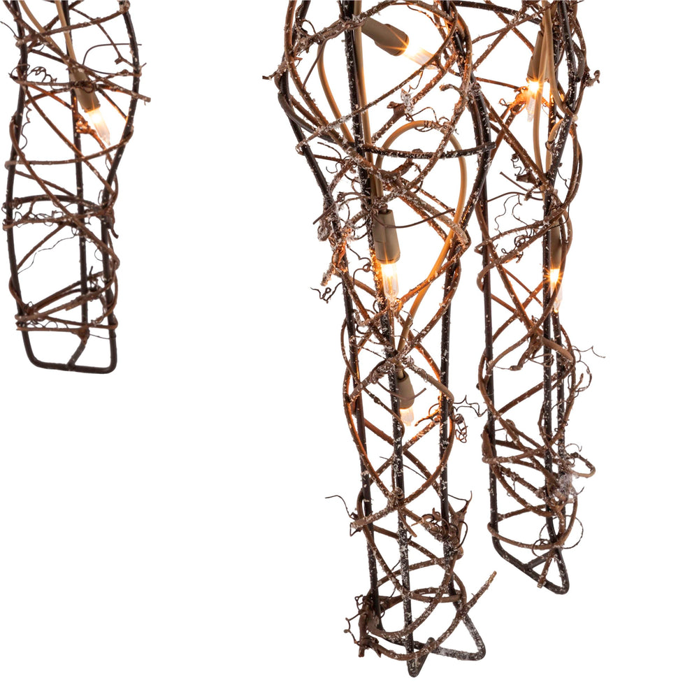 Alpine Corporation reindeer beside porch railing illustrating compact 35-inch scale