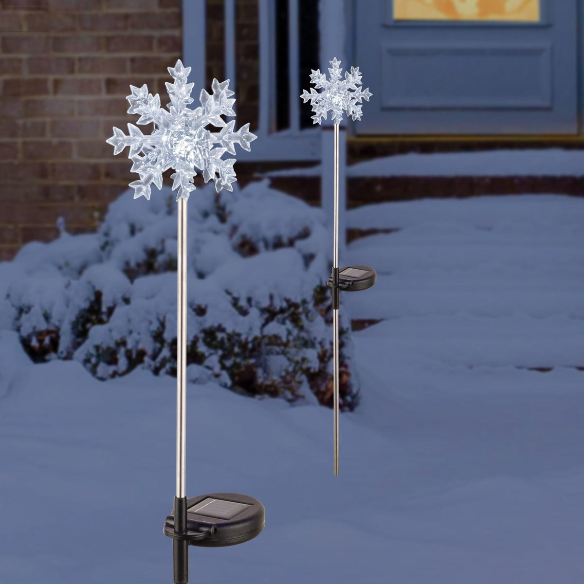 Alpine Corporation front view of snowflake stakes showing crisp white LEDs and festive look