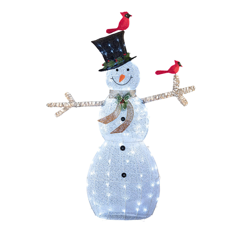 Alpine Corporation snowman staged in yard with other decor for festive atmosphere
