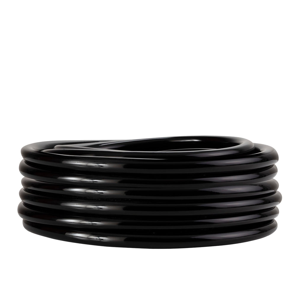 Alpine Corporation tubing connected to humidifier drain illustrating indoor condensate use