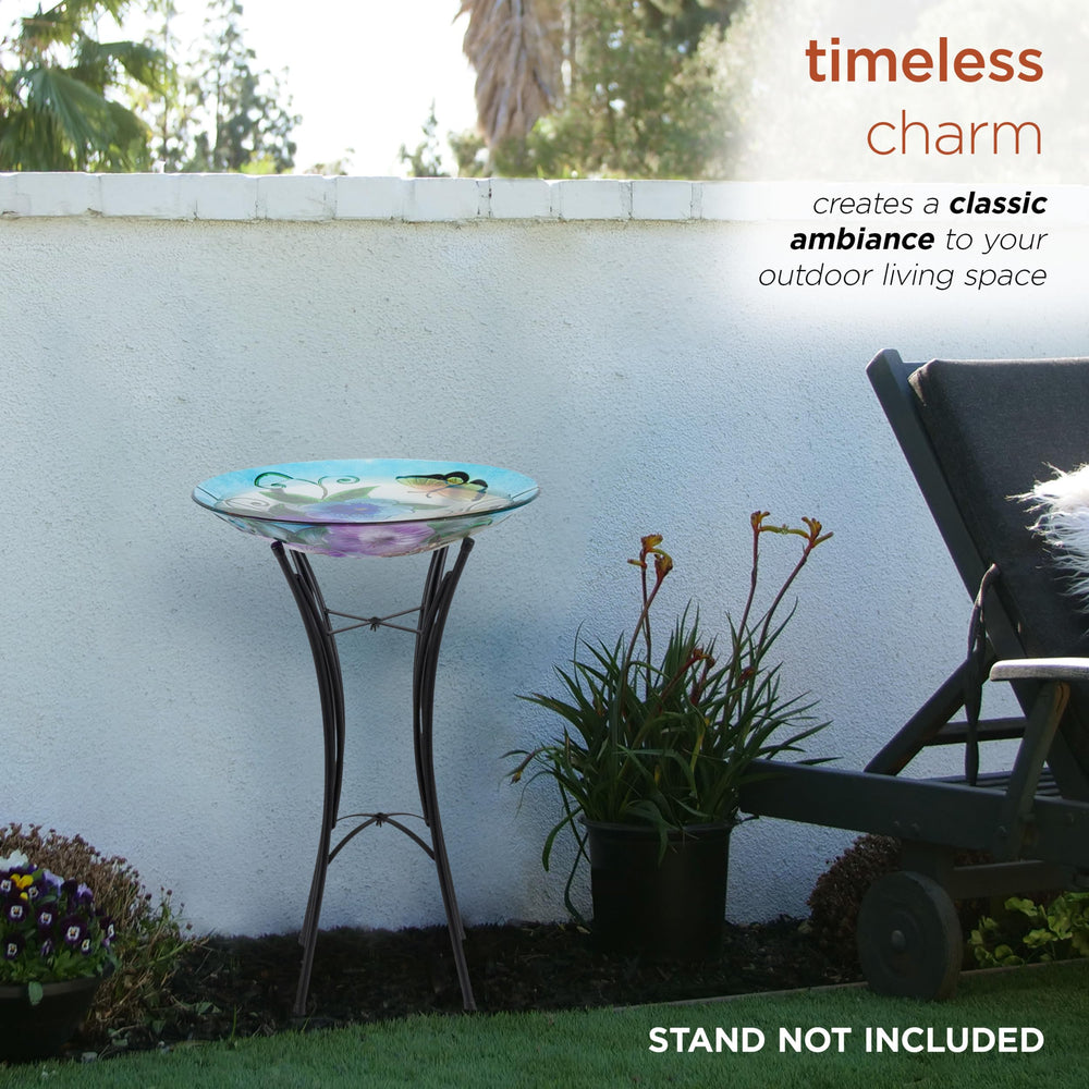 Alpine Corporation birdbath in use with a small bird bathing, attracting wildlife to your yard