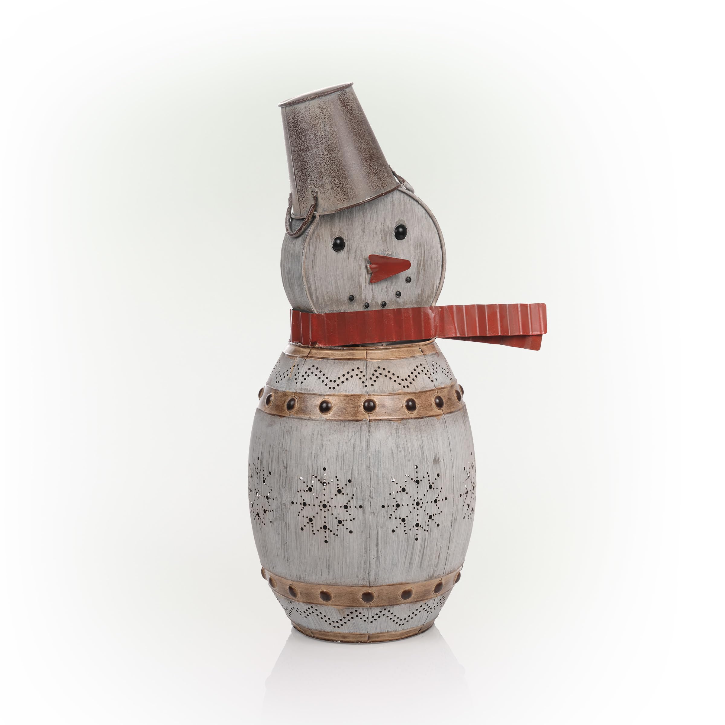 Alpine Corporation snowman among lawn decorations forming a layered seasonal scene