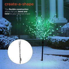 Alpine Corporation nighttime view of tree lit with 140 green LEDs adding vibrant holiday ambiance outdoors
