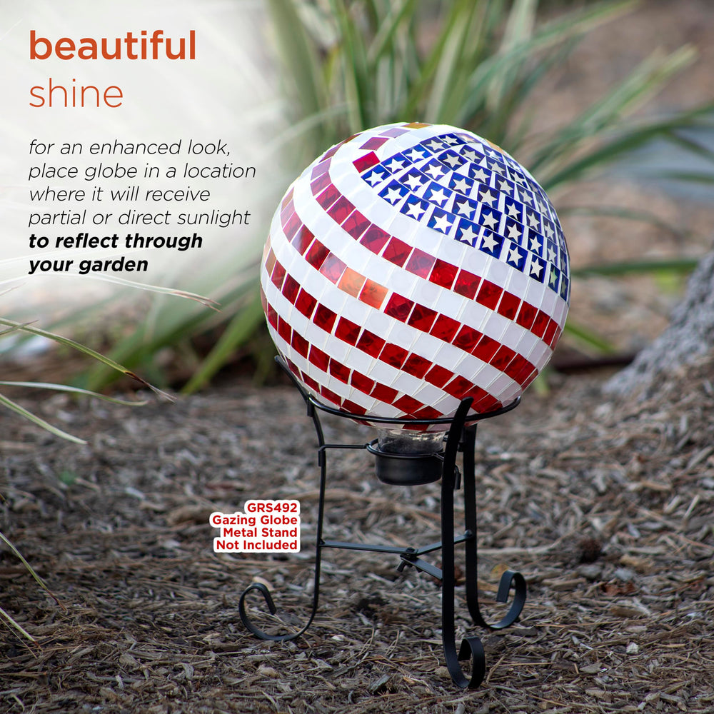 Alpine Corporation globe reflecting sunlight to enhance garden sparkle