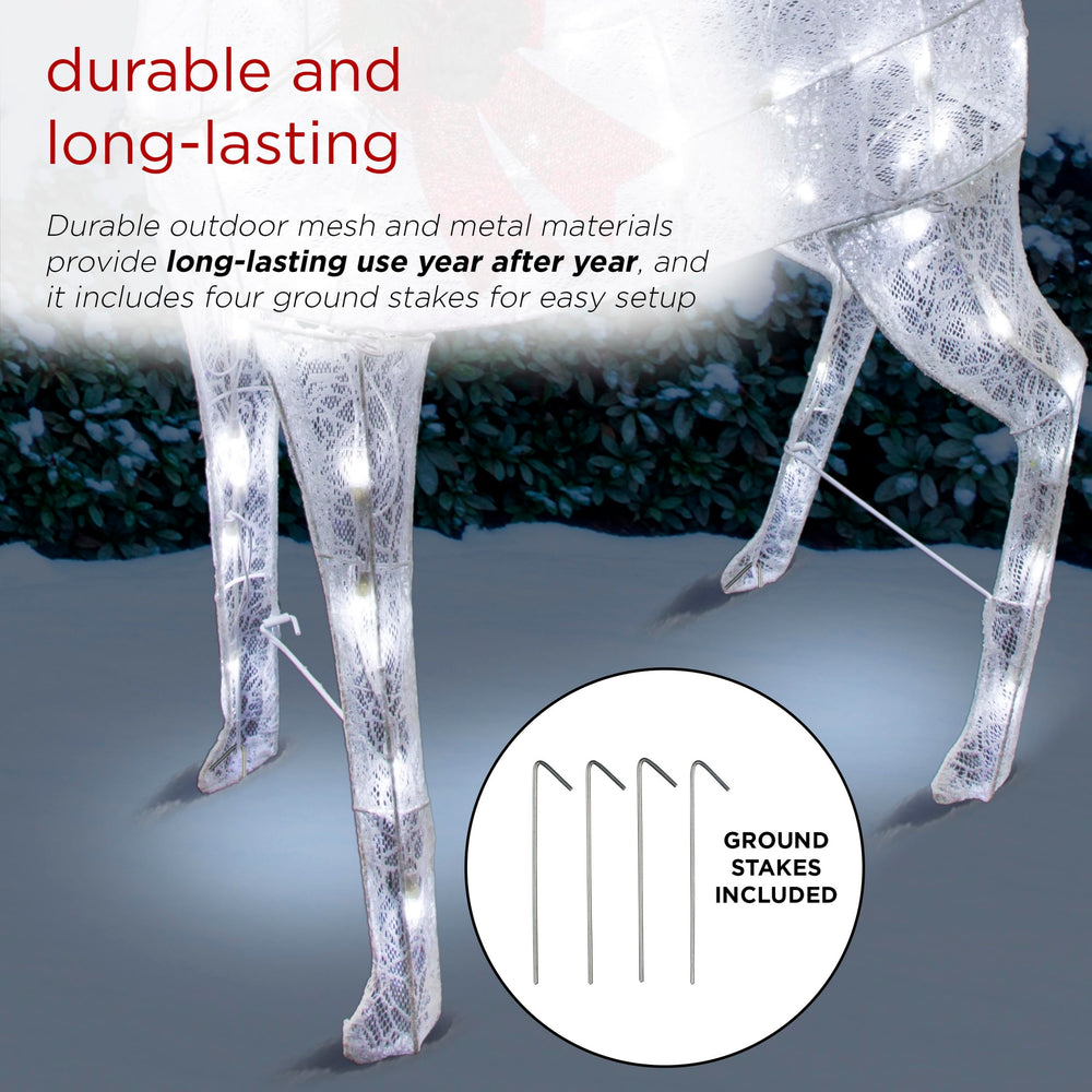 Alpine Corporation reindeer beside doorway demonstrating size and indoor use