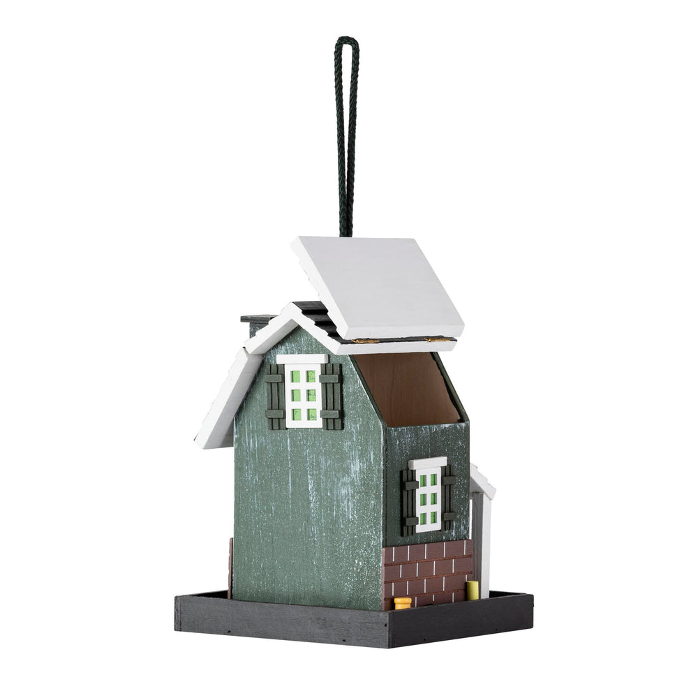 Alpine Corporation feeder next to ruler for scale showing compact footprint