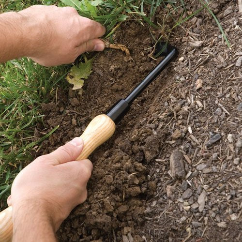 A.M. Leonard hardwood handle close-up showing weather-resistant finish for comfort