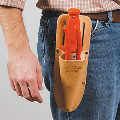 A.M. Leonard sheath next to soil knife and pruner to show scale and fit benefit