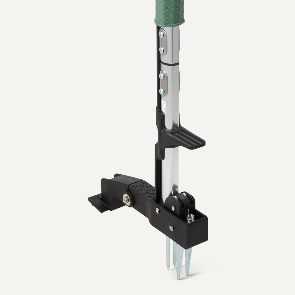 Amazon Basics weed puller in use in garden showing ergonomic posture benefit