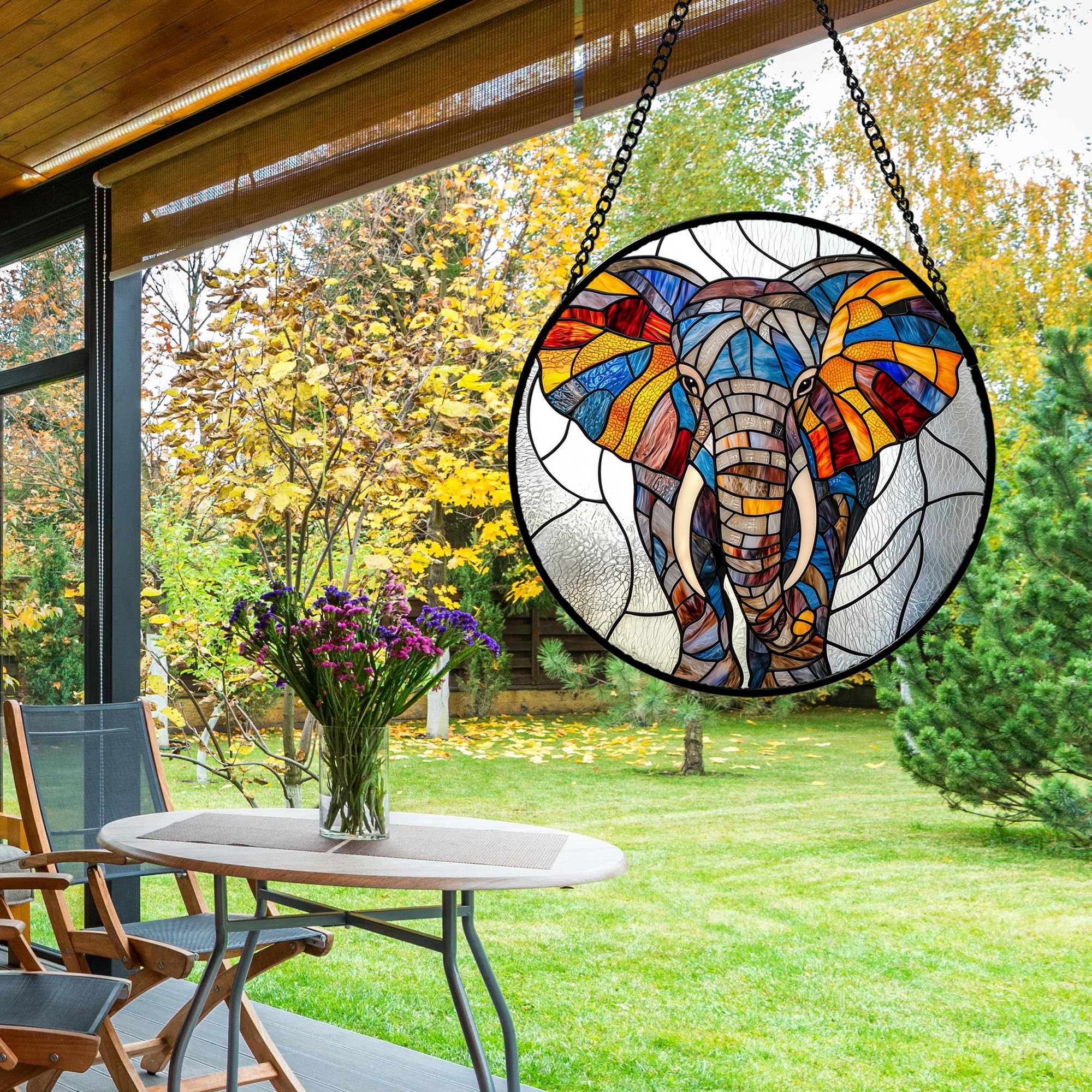 AMDERVEN hanging in window casting colorful highlights across room