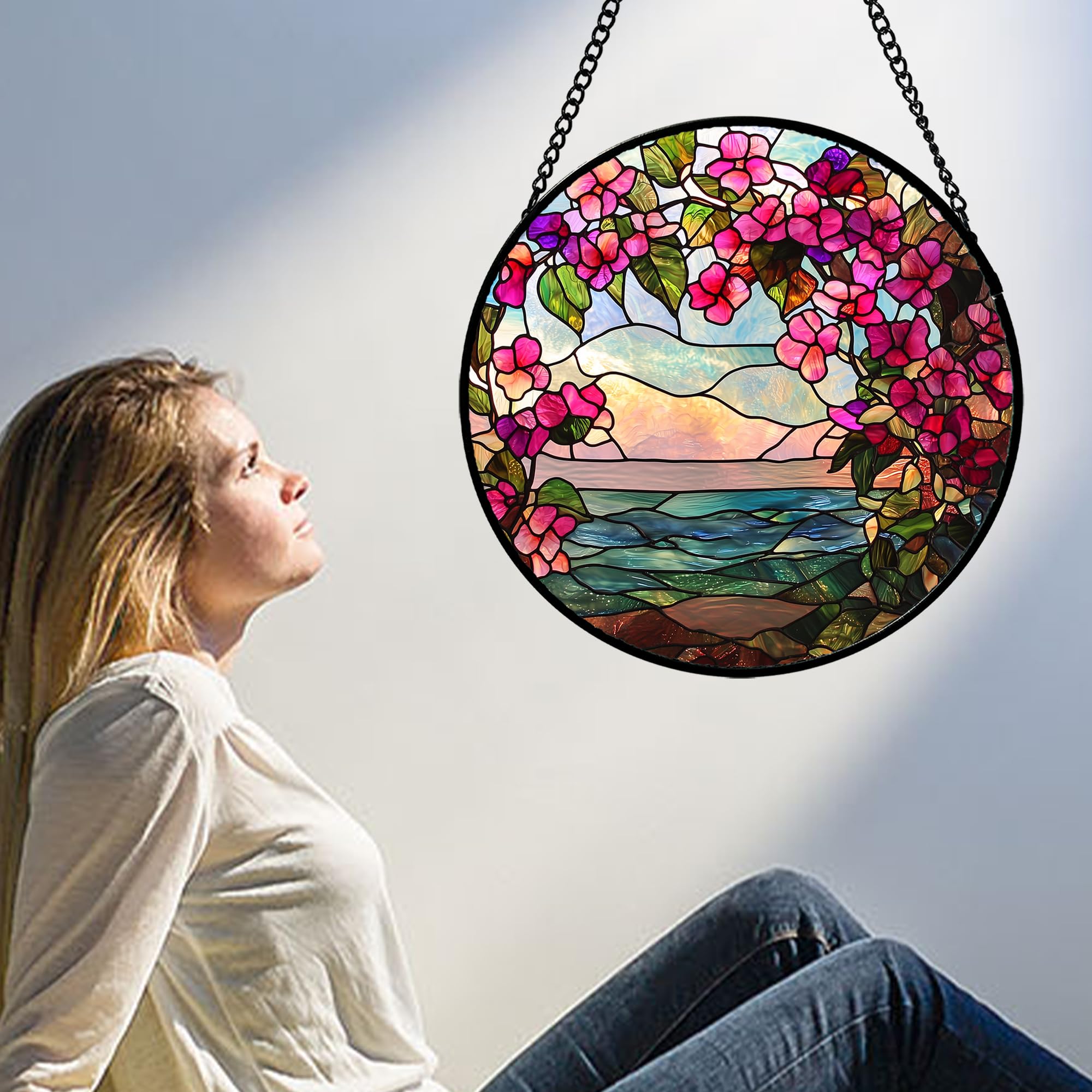 AMDERVEN suncatcher in a sunlit window casting colorful light for mood enhancement